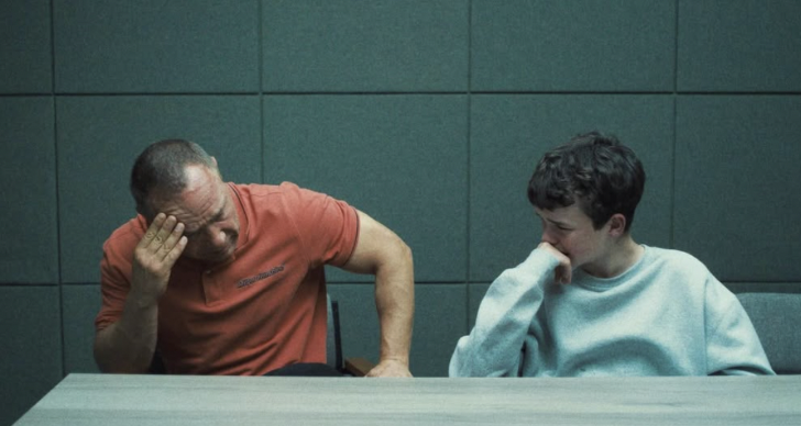 Jamie and his father as Jamie is being interviewed by police